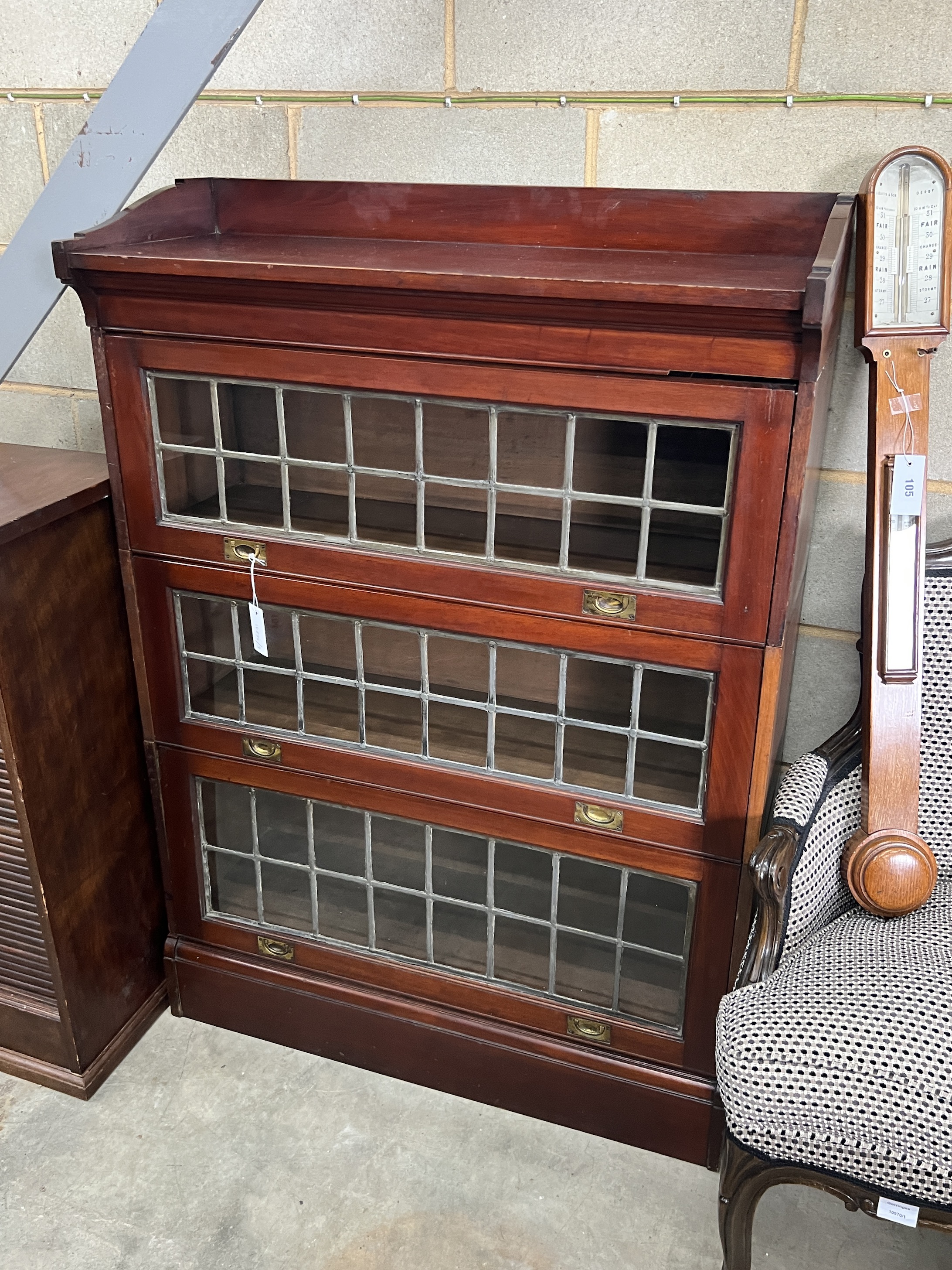 An early 20th century Globe Wernicke style mahogany three section bookcase, width 92cm, depth 36cm, height 129cm